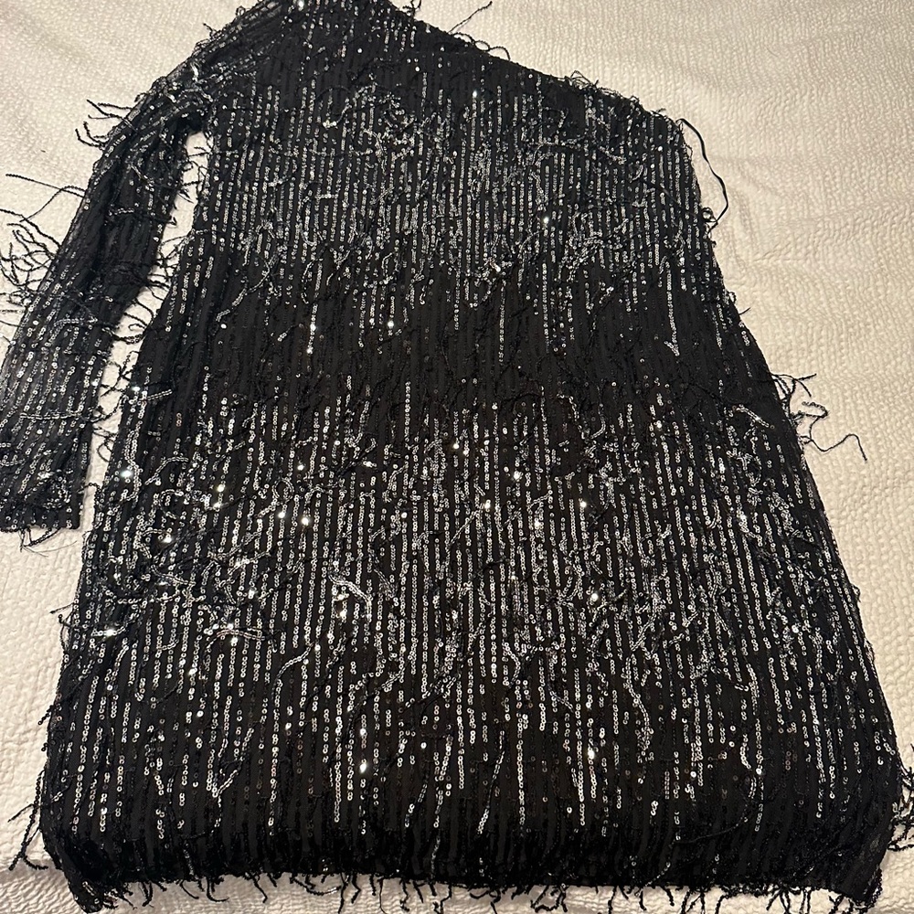 Sequin black mini dress. Off the shoulder. Never worn